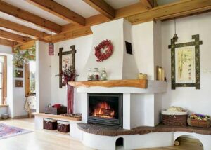 Ciepło domowego ogniska: kominek w wiejskim stylu, który stworzy przytulny klimat